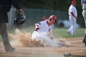 Photo courtesy of Bill Adams | The Express-Times. Jayson Mitch (9) slides into home, scoring the fifth run in the bottom of the second.